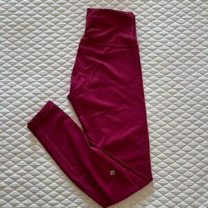 Lululemon -  Wunder Train Highrise Tight 28" - Size 6 - Pomegranate